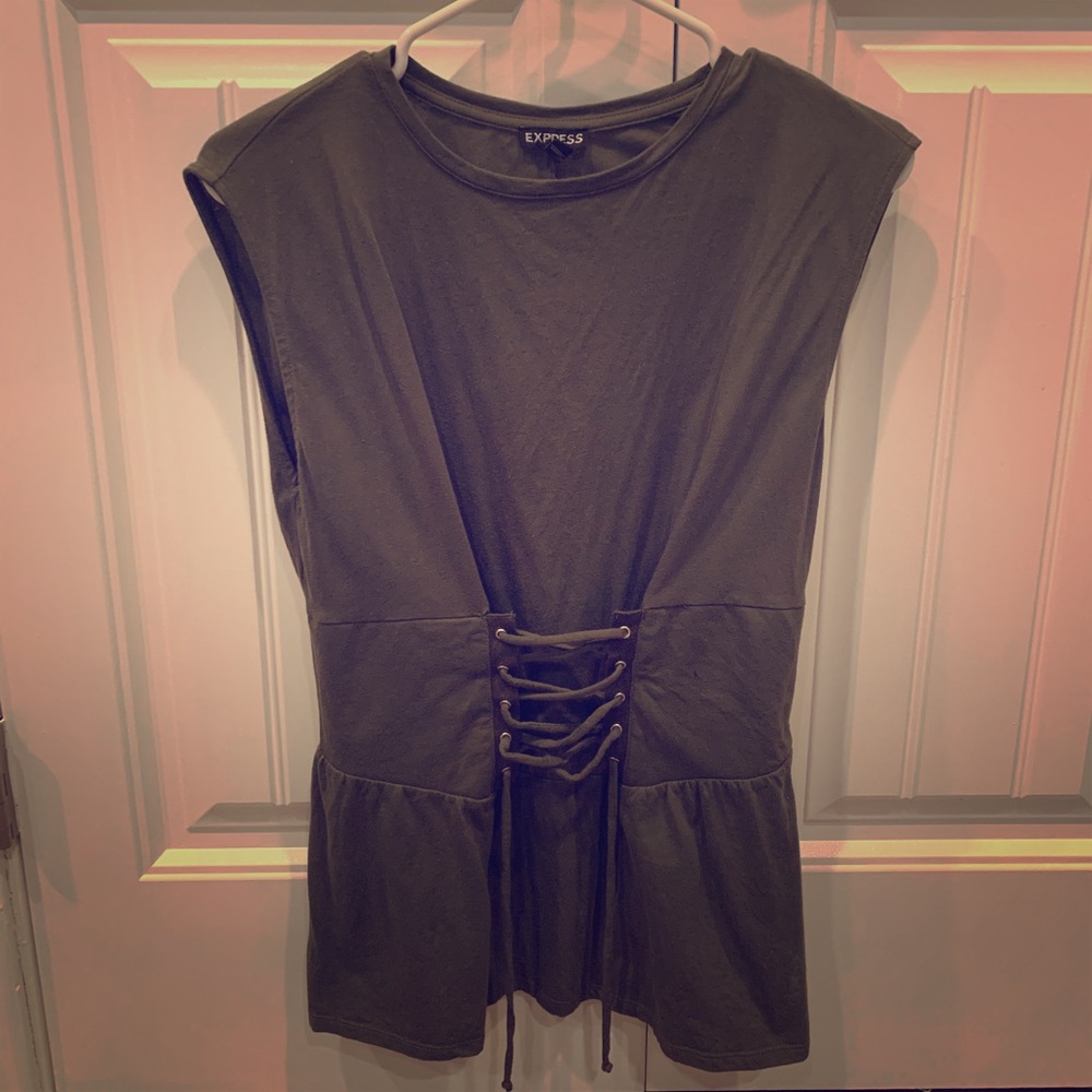 Lightly worn sleeveless top. Washed once.